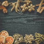 Dried Herbs And Ginseng, Top View Of Thai Herbs And Ginseng On Wooden Floor Stock Photo