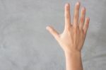 Hand Action Gesture On Grey Background Stock Photo