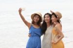 Portrait Of Asian Young Beautiful Woman Wearing Long Dress Stand Stock Photo