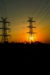 High Voltage Power Tower At Sunset Stock Photo