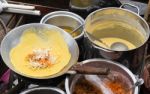 Cooking Padthai And Omelet On Street Market In Thailand Stock Photo