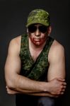 Military Style Camouflage On The Soldier's Face Stock Photo