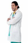 Medical Professional Posing With Arms Crossed Stock Photo