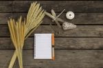 Blank Notebook With Grass Flower And Old Key Stock Photo