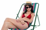 Sexy Bikini Model Relaxing On Deckchair Stock Photo