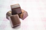 Delicious Chocolate Candy On The Table Stock Photo