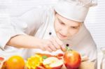 Chef Decorating Delicious Fruit Plate Stock Photo