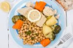 Codfish With Chickpeas And Vegetables Stock Photo