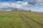 View Of Dunstanburgh Castle Stock Photo