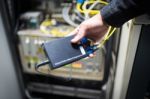 People Fix Node Fiber Optic In Network Room Stock Photo