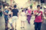 Blurred People Walking On The Street Of Old Town Stock Photo