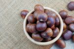 Chestnuts Roasted In A Bowl Stock Photo