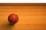 Basketball On Wooden Floor Stock Photo