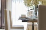 Table Set In Dinning Room At Home Stock Photo