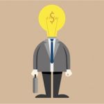 Businessman Light Bulb On Head In Suit Stock Photo