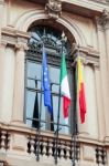 Colourful Flags On A Building In Bergamo Stock Photo