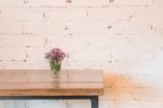 Room Interior White Brick Wall With Wooden Table Stock Photo