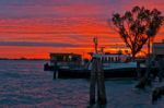 Venice Italy Sunset With Cruise Boat Stock Photo