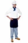 Young Male Chef, Hands On Waist Stock Photo