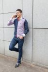 Portrait Of A Young Man With Talking On The Phone Stock Photo