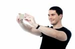 Handsome Smiling Man Taking A Selfie Stock Photo