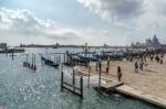 Gondolas Moored At The Entrance To The Grand Canal Stock Photo