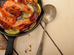 Roasted Shrimps With Zucchini And Tomatoes Stock Photo