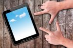 Hands Pointing To Touch Pad Stock Photo