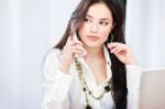 Woman On Phone Call In Office Stock Photo