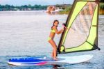 Little Girl Winsurfing On Ada Bojana, Montenegro Stock Photo