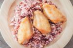 Grilled Chicken Wings With Multi Grains Berry Rice Stock Photo