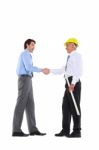 Two Men Shake Hands Stock Photo