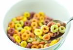 Bowl And Spoon With Cereal Stock Photo