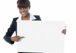 Executive Pointing Towards Blank Banner Stock Photo