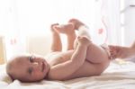 Mom Carefully Clean Baby Skin With Wet Wipes Stock Photo