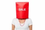 Young Girl Covering Her Face With Shopping Bag Stock Photo