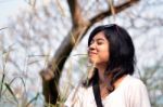 Young Asian Woman Breathing Fresh Air Stock Photo