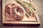 Bagels On Bread Board Stock Photo