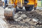 Construction Of A New Road. Excavator Prepares The Surface Stock Photo