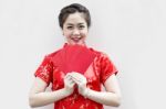 Chinese Woman Holding Red Envelopes Stock Photo