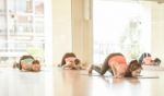 Asian Woman Doing Yoga Indoors Stock Photo