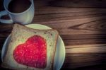 Delicious Slice Of Bread With Strawberry Jam Heart Shape Stock Photo