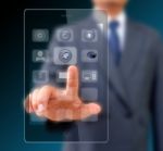 Businessman Touching Screen On Modern Mobile Smart Phone Stock Photo