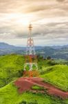 Telecommunication Tower On The Road Middle Of  Mountain Backgrou Stock Photo