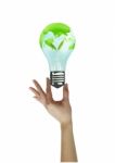 Hand Holding Litgh Bulb . Concept Love The Earth Stock Photo