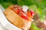 Original Italian Fresh Bruschetta Served With Fresh Salad And Ve Stock Photo