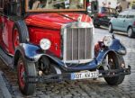 Old Fashioned Red Bus In Rothenburg Stock Photo