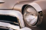 Close-up Of The Front Of The Brown Vintage Car Stock Photo