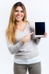 Beautiful Woman Showing Digital Tablet. Isolated On White Stock Photo