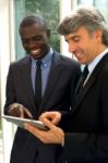 Businessmen With Tablet Stock Photo